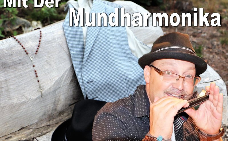 Der Junge Mit Der Mundharmonika